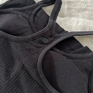 New lululemon razorback tank. Size 6 black. Never worn